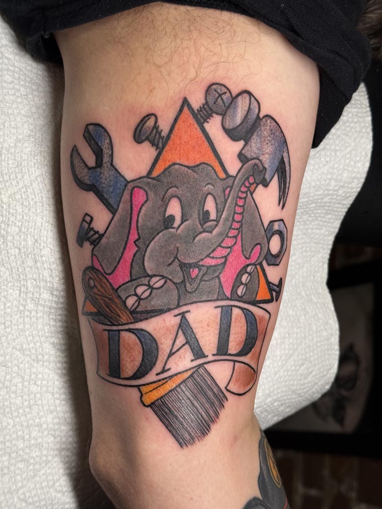 Colorful elephant "Dad" tattoo
