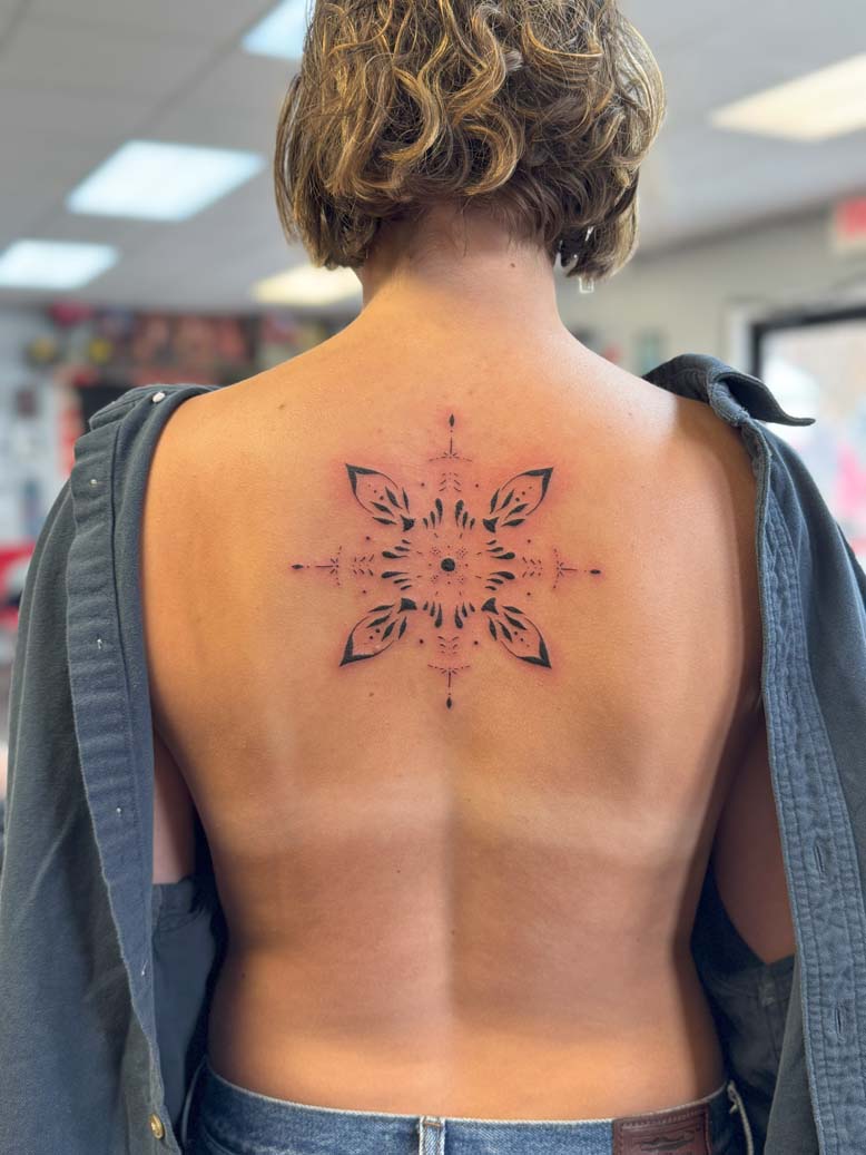 Mandala black in center back tattoo