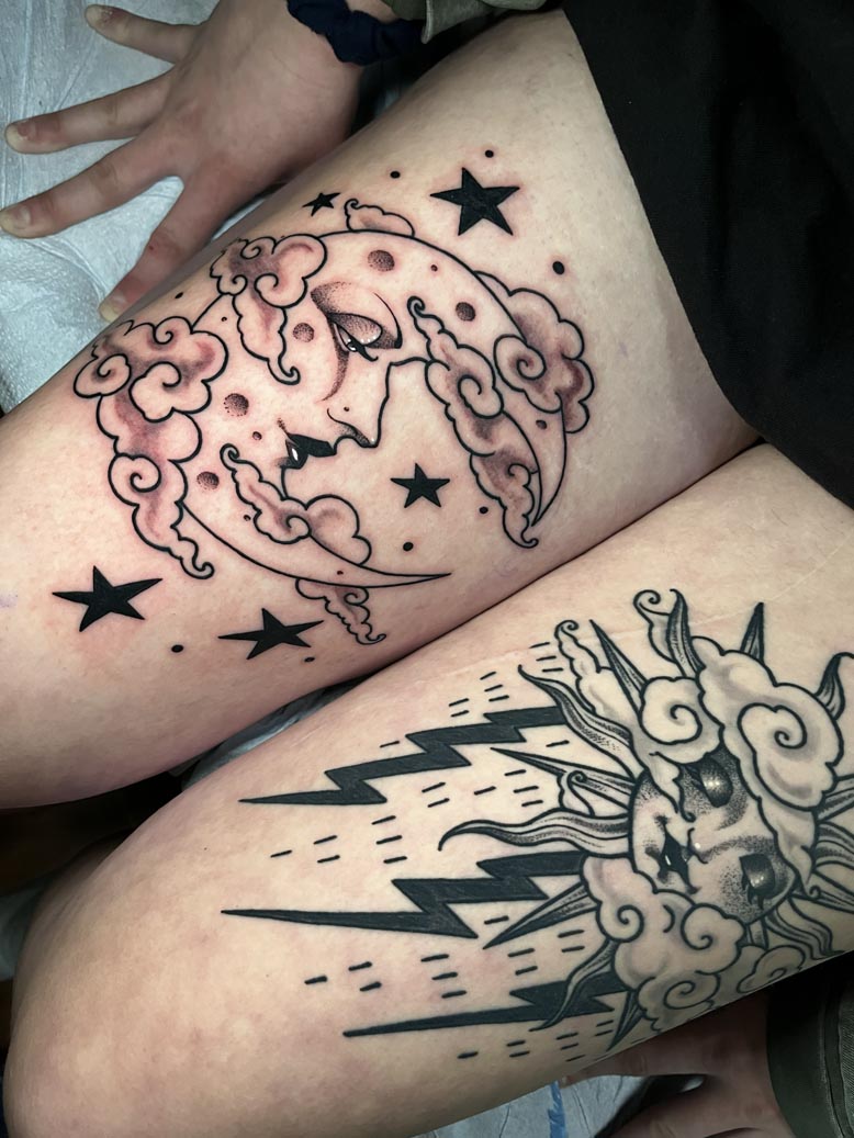Two celestial thigh tattoos