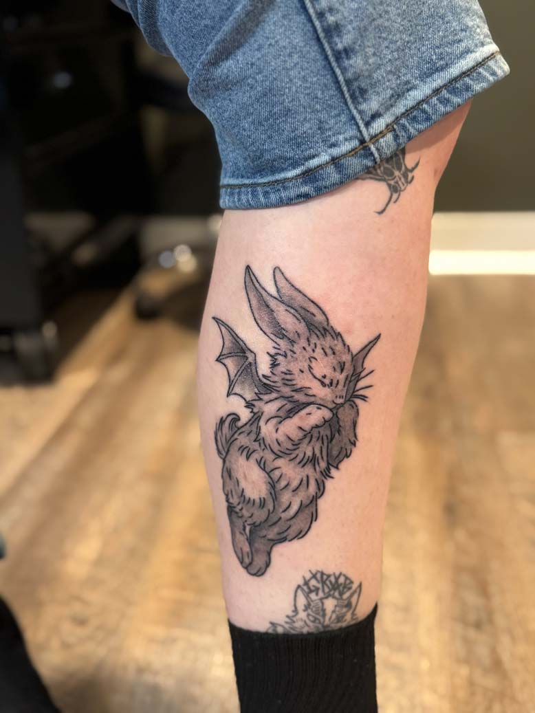 Bat bunny leg tattoo