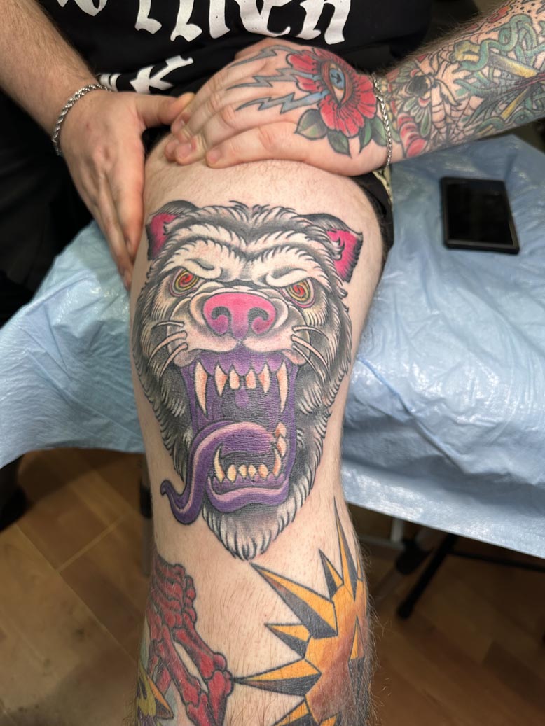 Colorful cartoon bear tattoo
