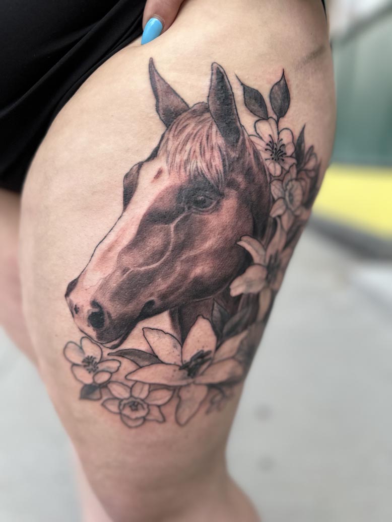 Horse portrait thigh tattoo