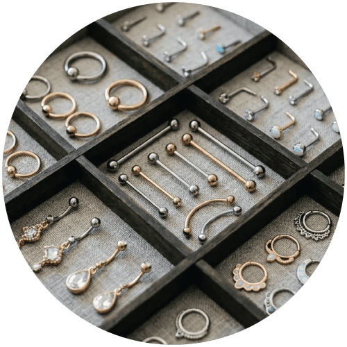Tray of a selection of body jewelry pieces