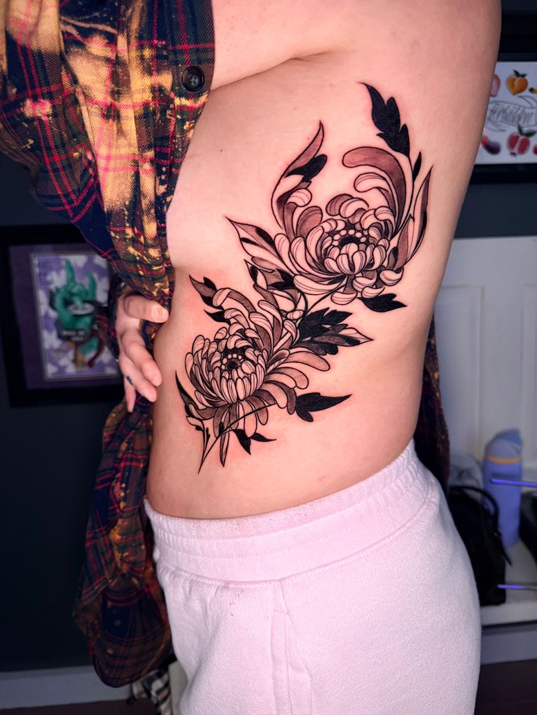 Floral side tattoo
