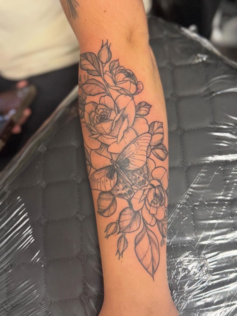 Moth and Flowers Black Ink Arm Tattoo