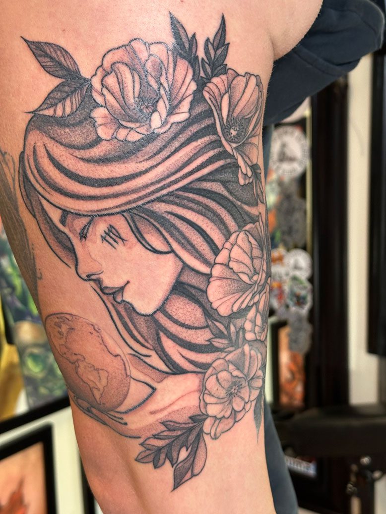 Tattoo of a woman's profile